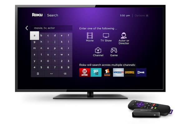 TV displaying Roku's streaming platform, and Roku streaming devices in the foreground