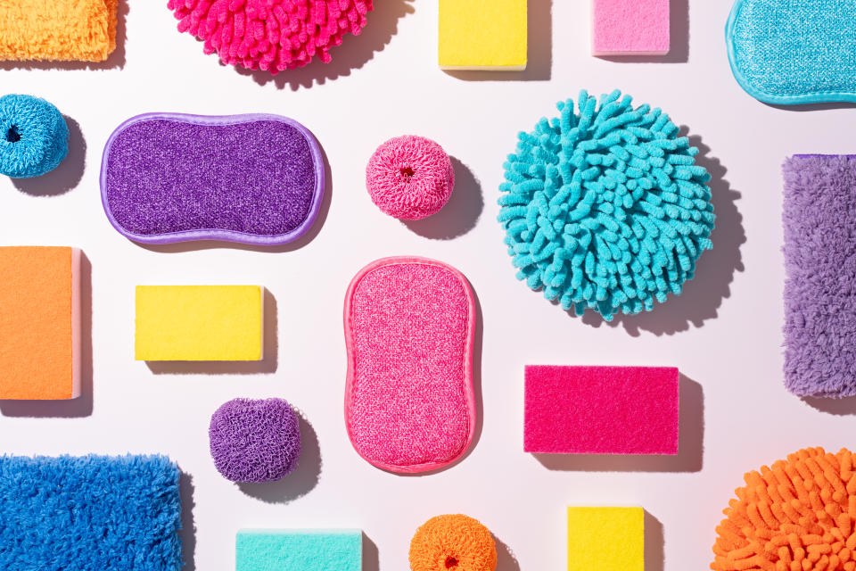 amazon cleaning supplies, A Collection of Multi Colored Cleaning Supplies Collection Includes Chenille Microfiber Cleaning Cloth, Rag, Scouring Pad, Cleaning Sponge, Dish Cloth and Dish Towel on Pink Background Directly above View.