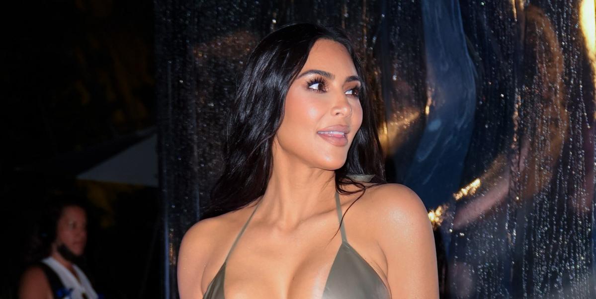 Kim Kardashian Wears Tiny Blue swimsuit On Tropical Vacation