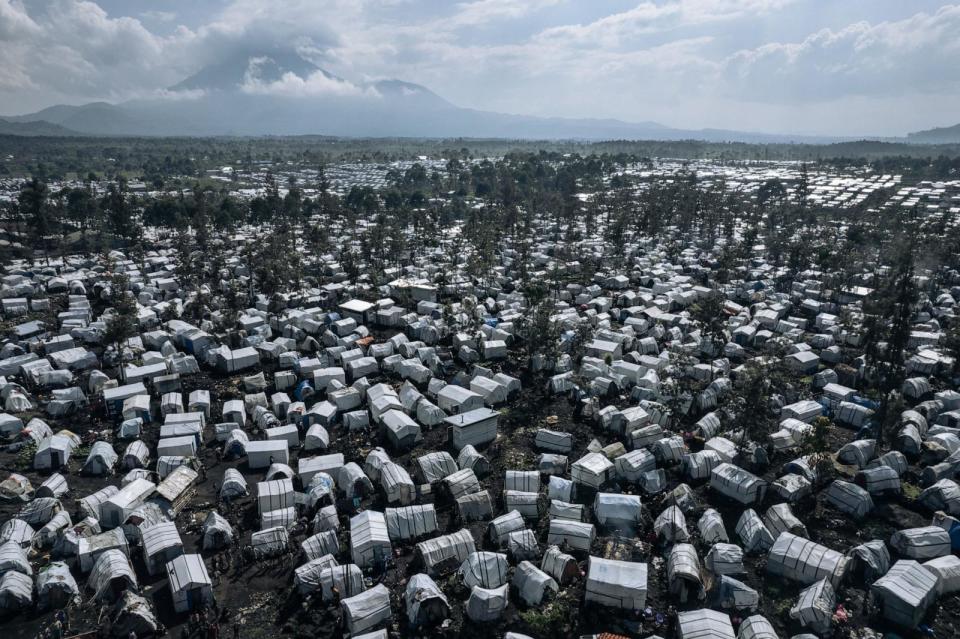 PHOTO: This aerial photograph, taken on Oct. 2, 2023, shows the Rusayo IDP camp, home to tens of thousands of war-displaced people on the outskirts of Goma in the East of the Democratic Republic of Congo.  (Alexis Huguet/AFP via Getty Images, FILE)