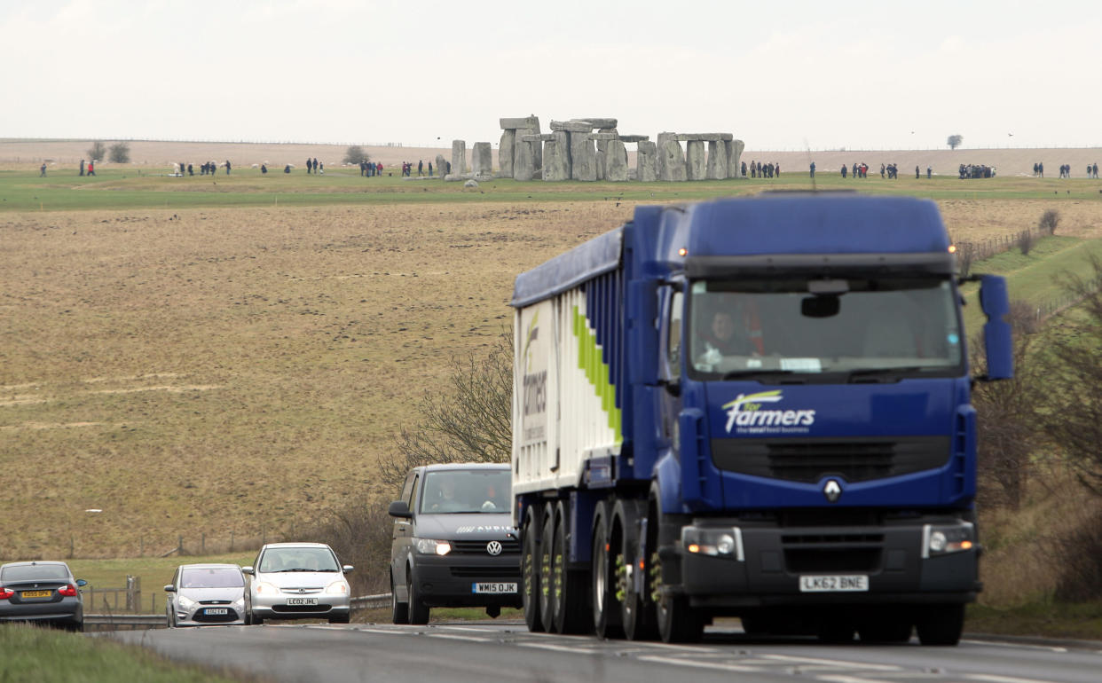 File photo dated 06/02/17 of traffic passing Stonehenge on the A303 road in Wiltshire. The economic case for building a road tunnel near Stonehenge relies on "uncertain" benefits, the public spending watchdog has warned.
