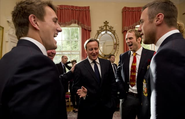 Alun Wyn Jones, centre right, and his team meet Prime Minister David Cameron after the Lions' victorious 2013 tour