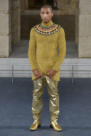 Pharrell Williams walks the runway at Chanel Metiers D'Art 2018/2019 Fashion show at The Metropolitan Museum of Art on December 04, 2018 in New York City.