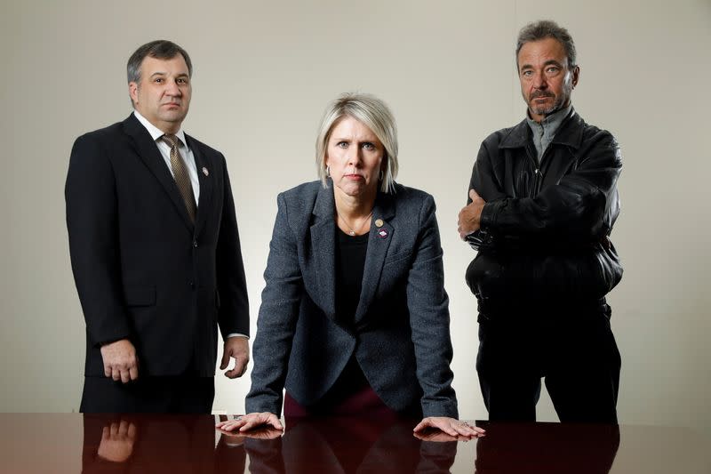 Members of the judicial system pose for a photo