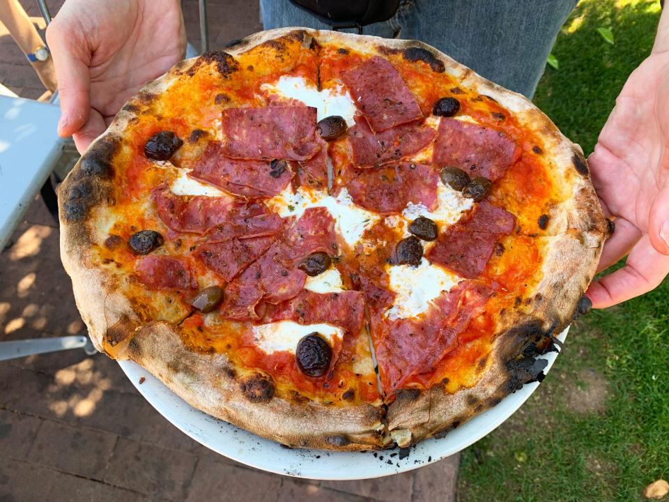 The Sonny Boy with salame and olives is one of the most popular pies at Pizzeria Bianco.