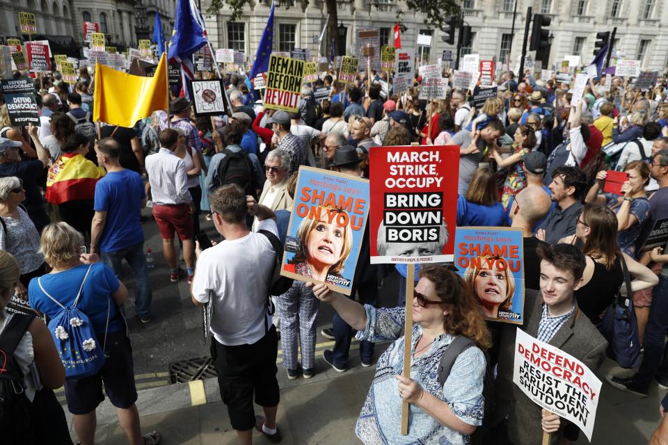 Anti Brexit protesters demonstrate during a rally outside Downing Street in London, Saturday, Aug. 31, 2019. Political opposition to Prime Minister Boris Johnson's move to suspend Parliament is crystalizing, with protests around Britain and a petition to block the move gaining more than 1 million signatures. (AP Photo/Alastair Grant)