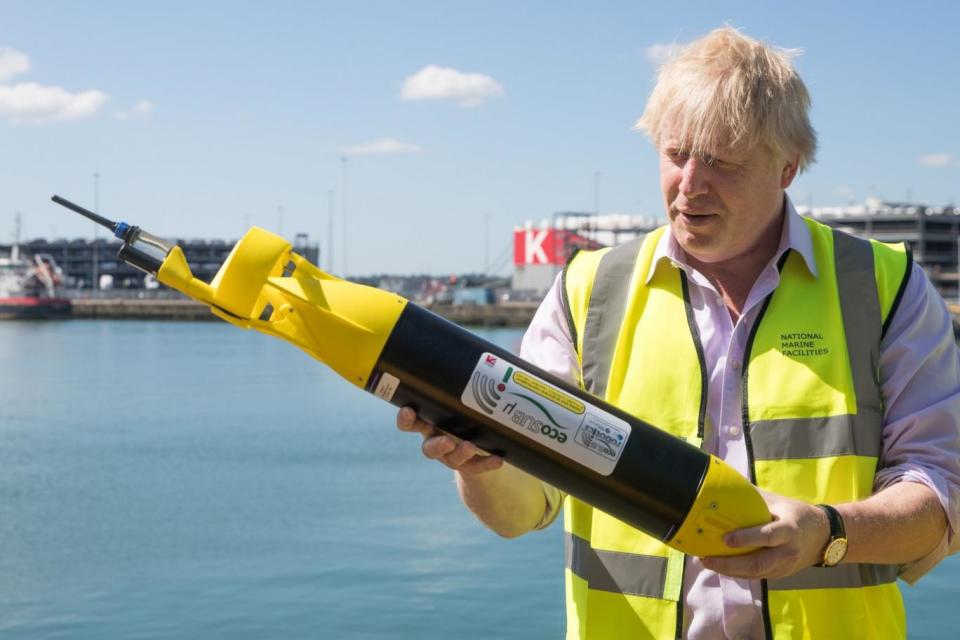 Boris Johnson holds one of the products by ecoSUB robotics (Getty Images)