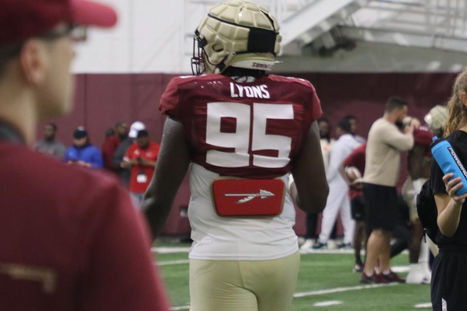 FSU defensive tackle Daniel Lyons finishes a rep during the Seminoles' fourth spring football practice on Friday, March 11, 2022.