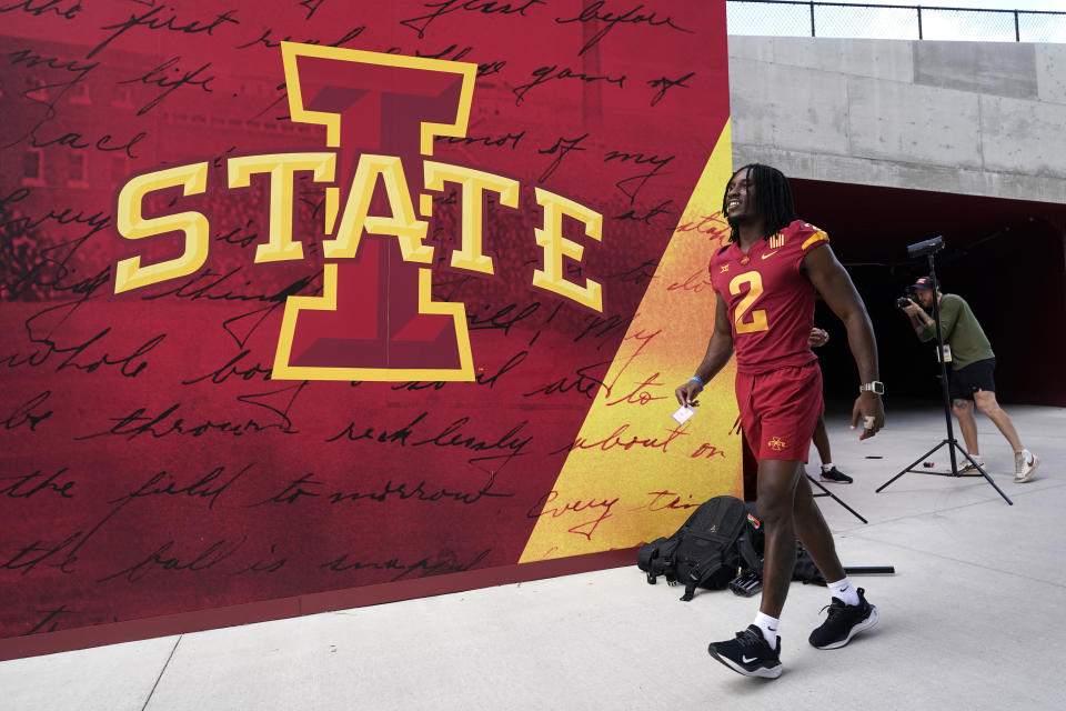 Iowa State defensive back T.J. Tampa walks to the field during an NCAA college football media day, Friday, Aug. 4, 2023, in Ames, Iowa. (AP Photo/Charlie Neibergall)