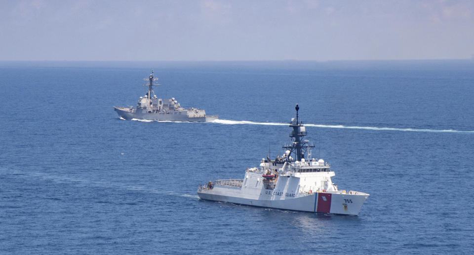 FILE - In this Aug. 27, 2021, file photo provided by U.S. Coast Guard, Legend-class U.S. Coast Guard National Security Cutter Munro (WMSL 755) transits the Taiwan Strait during a routine transit with Arleigh Burke class guided-missile destroyer USS Kidd (DDG 100).  Source: AAP