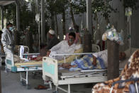 Patients are connected to oxygen tanks at the Afghan-Japan Communicable Disease Hospital, for COVID-19 patients in Kabul, Afghanistan, Thursday June 18, 2020. Afghan media reported last week that several COVID-19 patients died in government hospitals due to shortages of medical oxygen, though the government denied the reports. (AP Photo/Rahmat Gul)