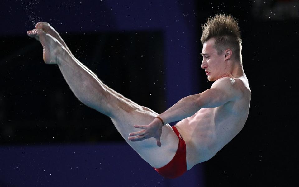 England's Jack Laugher competing in the men's 3m springboard diving final  - AFP