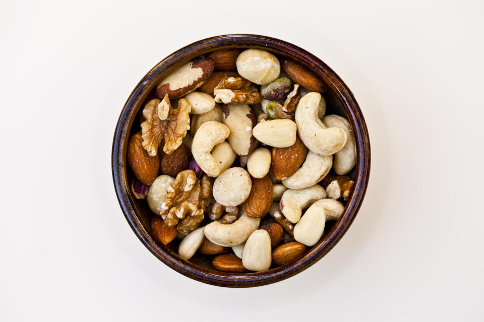Close-up of a bowl of mixed raw nuts.