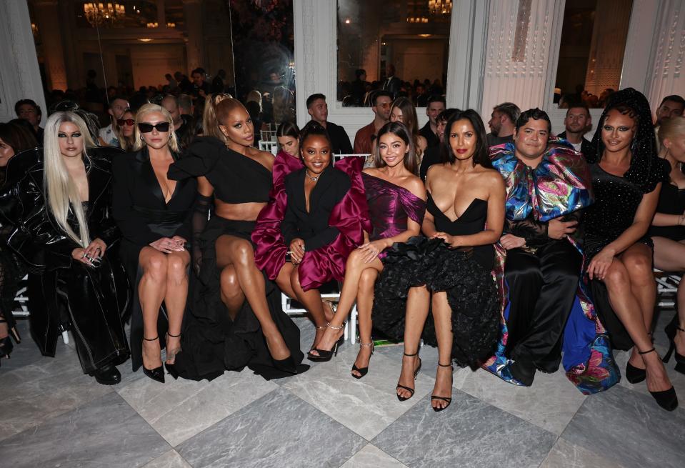 From left, Avril Lavigne, Kesha, Laverne Cox, Quinta Brunson, Sarah Hyland, Padma Lakshmi, Harvey Guillén and Sasha Colby attend the Christian Siriano spring/summer 2024 runway show at The Pierre Hotel on Sept. 8, 2023, in New York City.