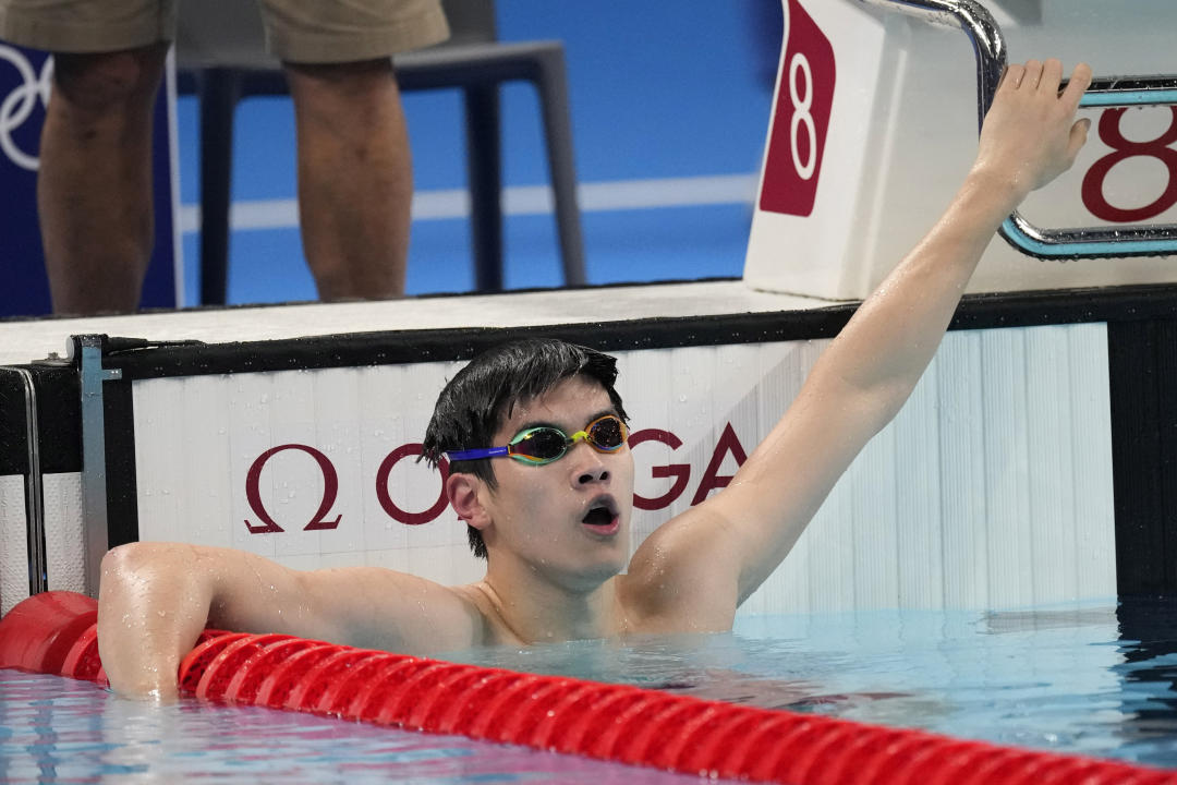 Pan Zhanle of China reacts after competing in the semifinals of the men's 100-meter freestyle during the 2024 Summer Olympics, Tuesday, July 30, 2024, in Nanterre, France. (AP Photo/Ashley Landis)