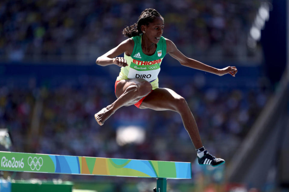 Ethiopian runner Etenesh Diro continues to compete in the 3000M Steeplechase after losing her shoe.