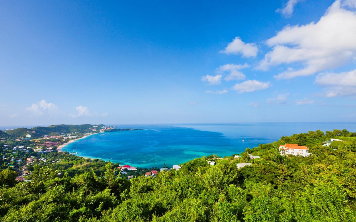 The mountainous and lush interior of Grenada is framed by a number of gorgeous, soft-sand beaches - Flavio Vallenari