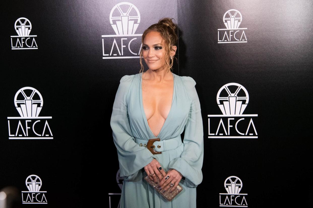 The 50-year-old singer, dancer and actress, turned heads with the deep plunge gown at the 2020 LAFCA on Saturday night.