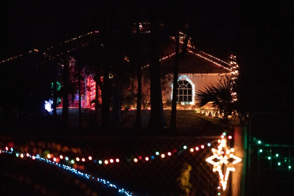 Decorations sit outside of the home of Annette Kniola in Golden Gate Estates on Wednesday, Dec. 6, 2023.