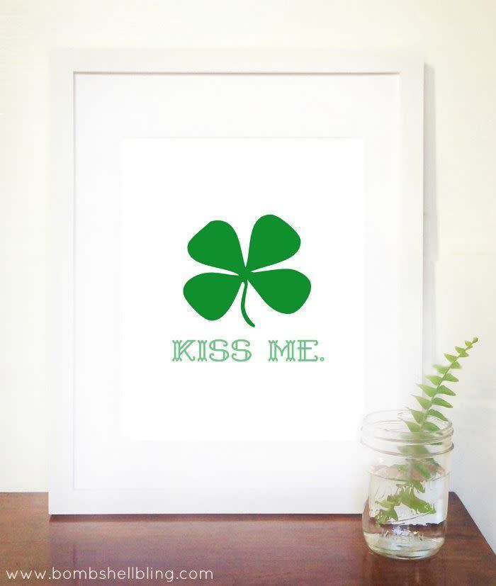 framed print reading kiss me with a shamrock