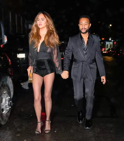 <p>Gotham/GC Images</p> Chrissy Teigen and John Legend in New York City