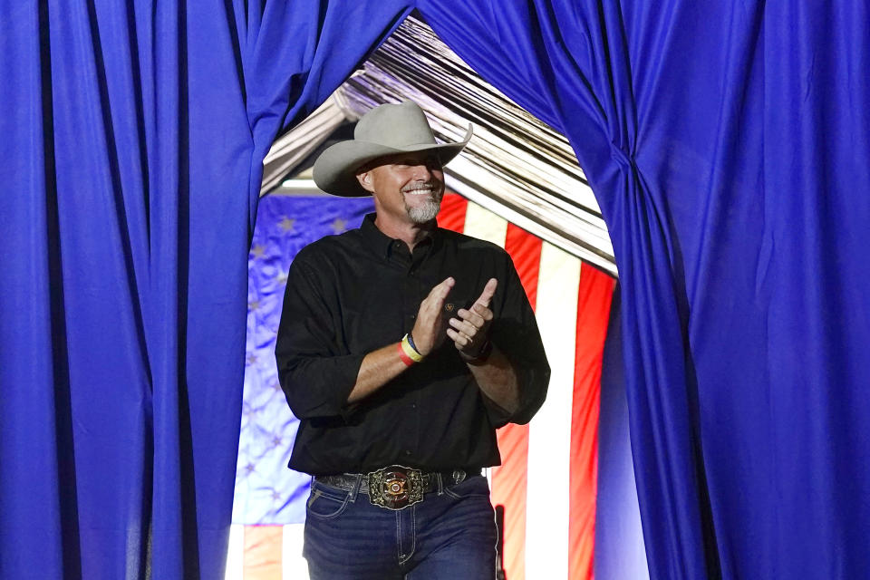 Pinal County sheriff Mark Lamb applauds as he walks on stage at a Save America Rally Friday, July 22, 2022, in Prescott, Ariz. Lamb has filed federal paperwork to run for the U.S. Senate in Arizona, Monday, April 10, 2023, becoming the first Republican to jump into a high-profile race for the seat now held by independent Sen. Kyrsten Sinema. (AP Photo/Ross D. Franklin)