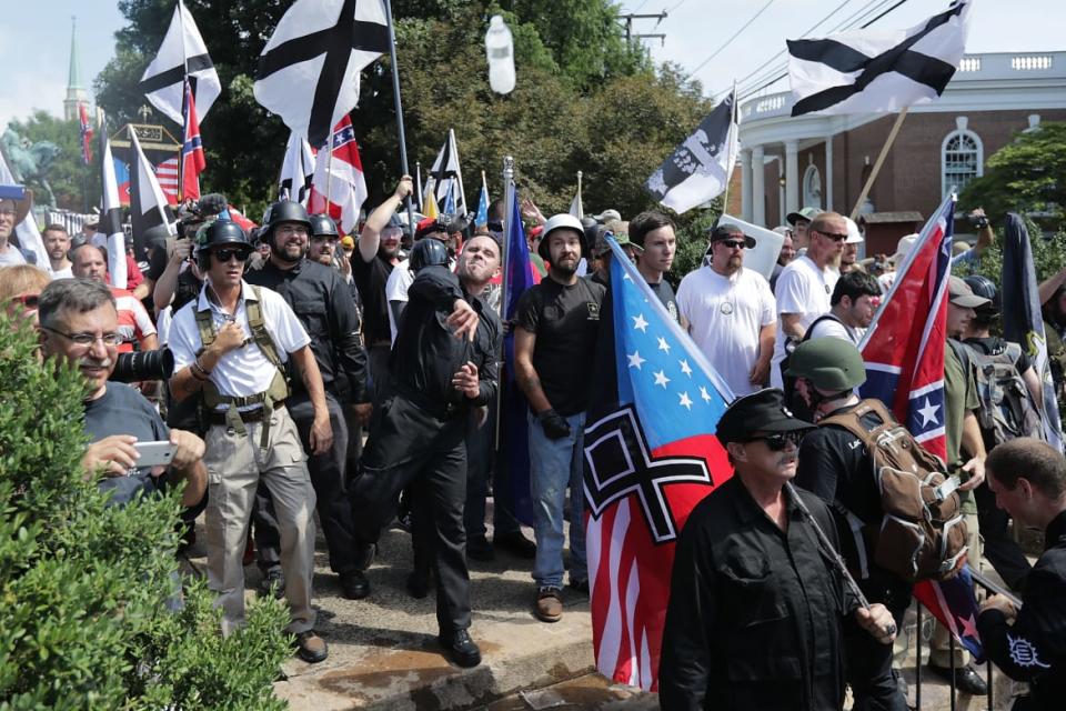 <div class="inline-image__caption"><p>Hundreds of white nationalists, neo-Nazis, KKK and members of the alt-right attack counter demonstrators on the outskirts of Emancipation Park during the Unite the Right rally, Aug. 12, 2017, in Charlottesville, Virginia. </p></div> <div class="inline-image__credit">Chip Somodevilla/Getty</div>