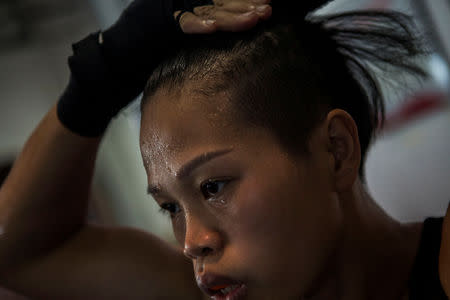 Huang Wensi in action during her final training session in Ningbo, Zhejiang province, China, before she heads to Taiwan for her Asia Female Continental Super Flyweight Championship match, September 22, 2018. REUTERS/Yue Wu