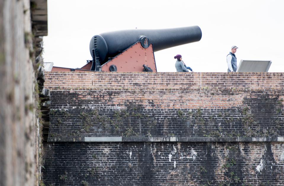 Visitors explore Fort Pickens at the Gulf Islands National Seashore.