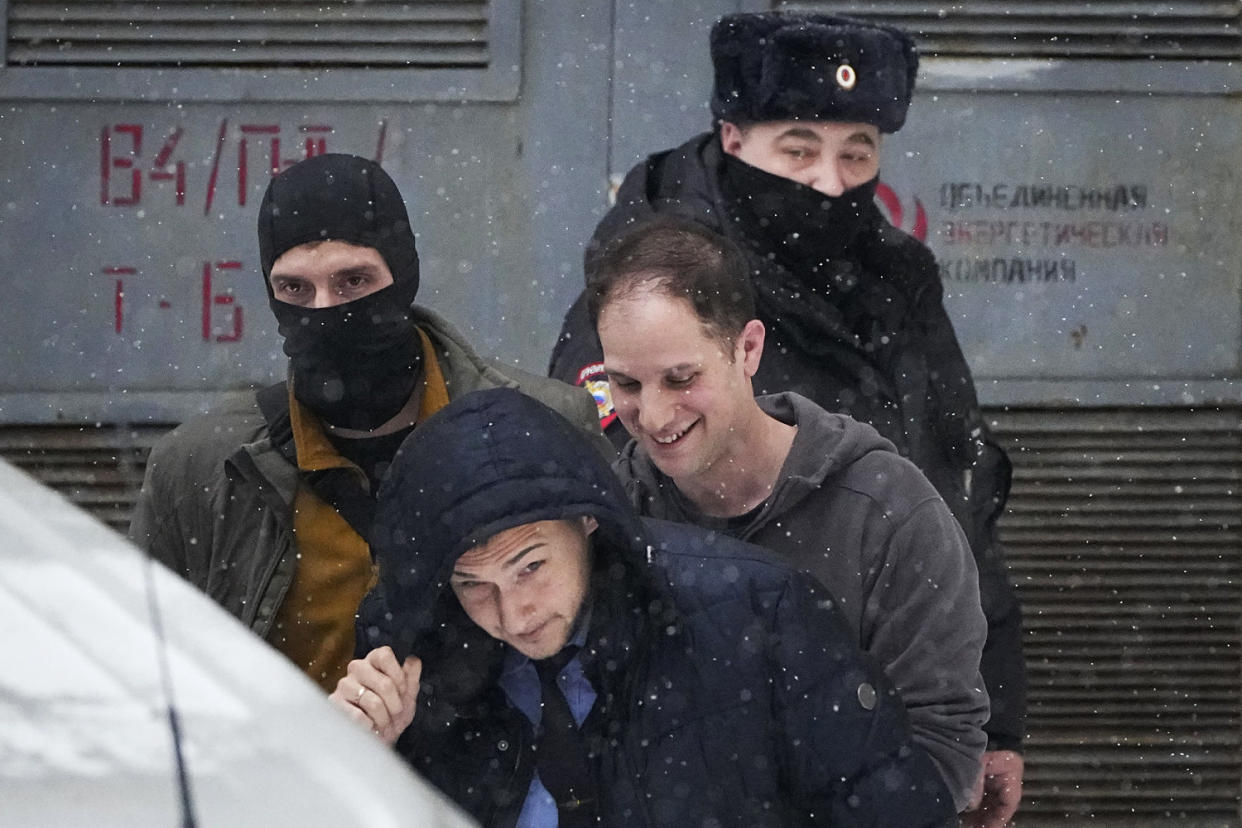  Evan Gershkovich escorted from court in Moscow on Jan. 26, 2024. (Alexander Zemlianichenko / AP)