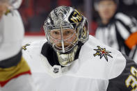 Vegas Golden Knights goaltender Jonathan Quick (32) watches the puck during the second period of an NHL hockey game against the Carolina Hurricanes in Raleigh, N.C., Saturday, March 11, 2023. (AP Photo/Karl B DeBlaker)