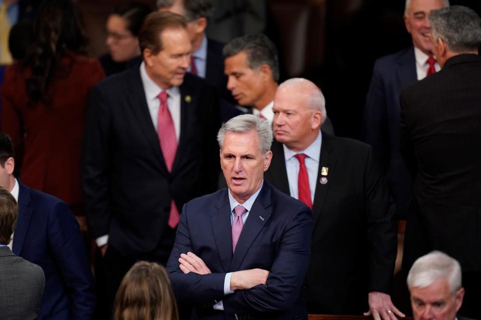 Rep. Kevin McCarthy, R-Calif., listens during the twelfth round of voting in the House chamber as the House meets for the fourth day to elect a speaker and convene the 118th Congress in Washington, Friday, Jan. 6, 2023.