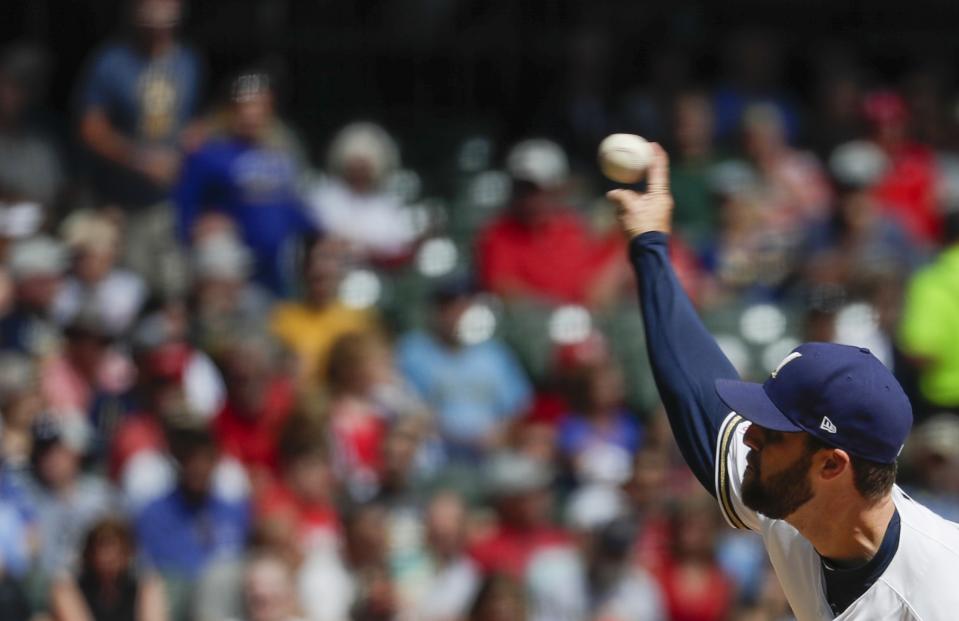 Milwaukee Brewers starting pitcher Jordan Lyles throws during the first inning of a baseball game against the St. Louis Cardinals Wednesday, Aug. 28, 2019, in Milwaukee. (AP Photo/Morry Gash)