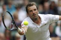 Britain Tennis - Wimbledon - All England Lawn Tennis & Croquet Club, Wimbledon, England - 30/6/16 France's Julien Benneteau in action against Japan's Kei Nishikori REUTERS/Andrew Couldridge