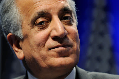 FILE PHOTO: Zalmay Khalilzad, former U.S. ambassador to Afghanistan, Iraq and the United Nations, listens to speakers during a panel discussion on Afghanistan at the Conservative Political Action conference (CPAC) in Washington, February 12, 2011. REUTERS/Jonathan Ernst/File Photo