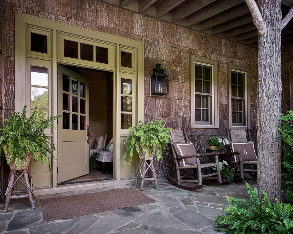 a house with a patio and chairs