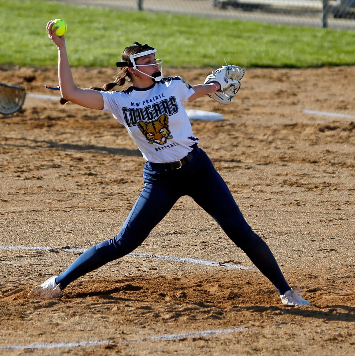 New Prairie junior Ava Geyer throws a pitch during a softball game against Saint Joseph Monday, April 8, 2024, at New Prairie High School in New Carlisle.