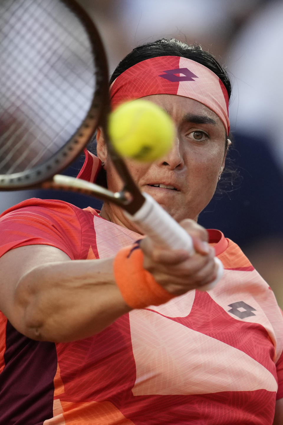 Tunisia's Ons Jabeur returns the ball to Serbia's Olga Danilovic during their third round match of the French Open tennis tournament at the Roland Garros stadium in Paris, Saturday, June 3, 2023. (AP Photo/Christophe Ena)