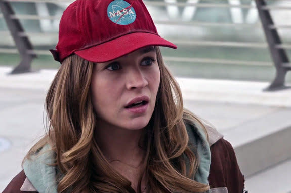 Actress Britt Robertson, as Casey Newton in Disney's new movie "Tomorrowland," sports a hat displaying NASA's logo.