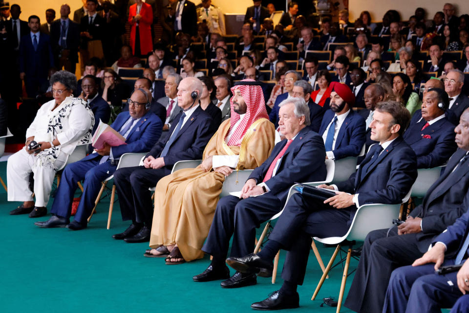 French President Emmanuel Macron, right, Saudi Crown Prince Mohammed bin Salman, flanked by UN Secretary-General Antonio Guterres, second right, listen to speakers at the New Global Financial summit in Paris Thursday, June 22, 2023. World leaders, heads of international organizations and activists are gathering in Paris for a two-day summit aimed at seeking better responses to tackle poverty and climate change issues by reshaping the global financial system. (Ludovic Marin, Pool via AP)