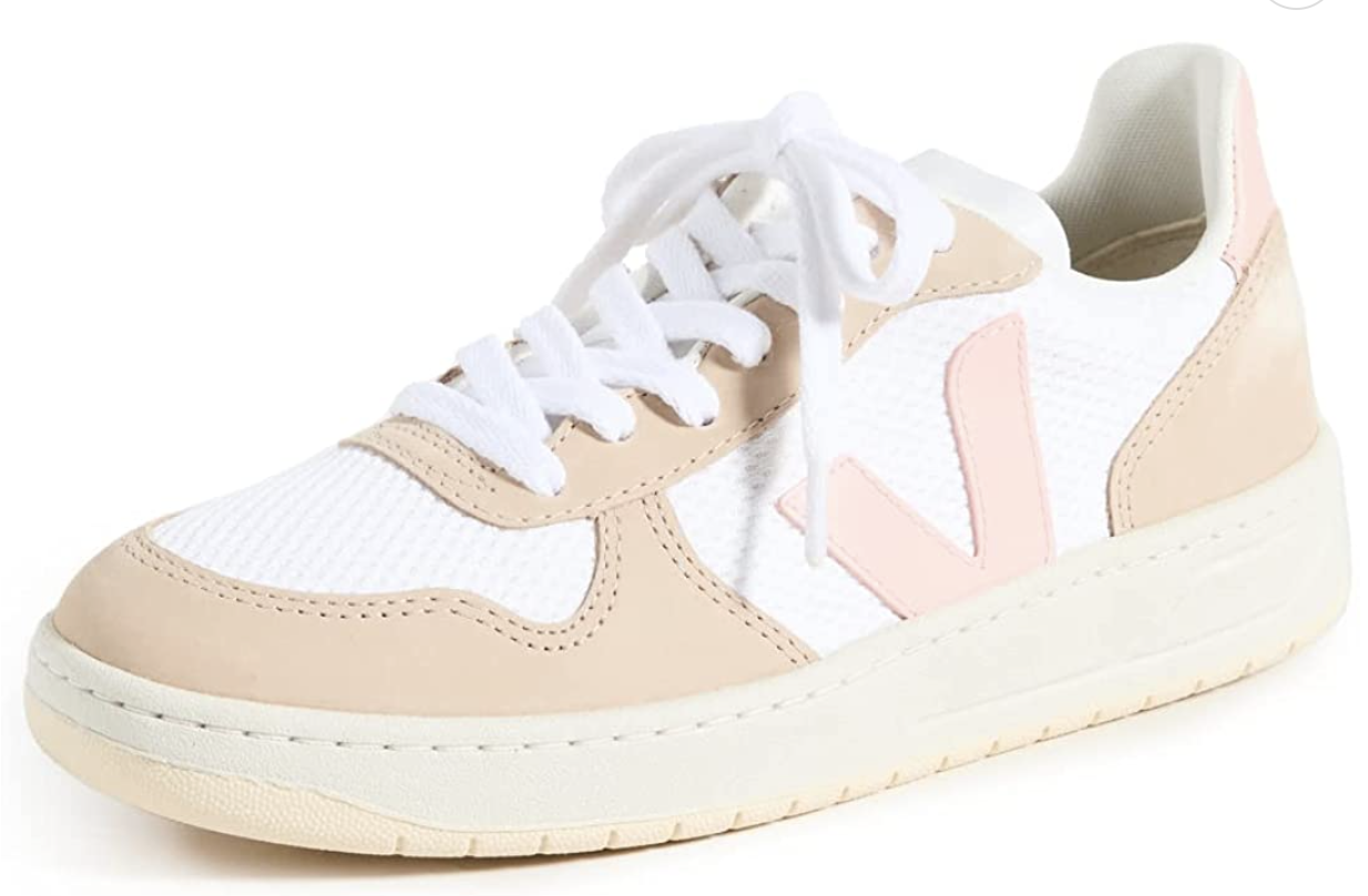 white sneakers with beige and pink details