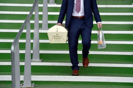 Britain Horse Racing - Royal Ascot - Ascot Racecourse - 17/6/16 General view of a racegoer at Ascot Reuters / Toby Melville Livepic EDITORIAL USE ONLY.