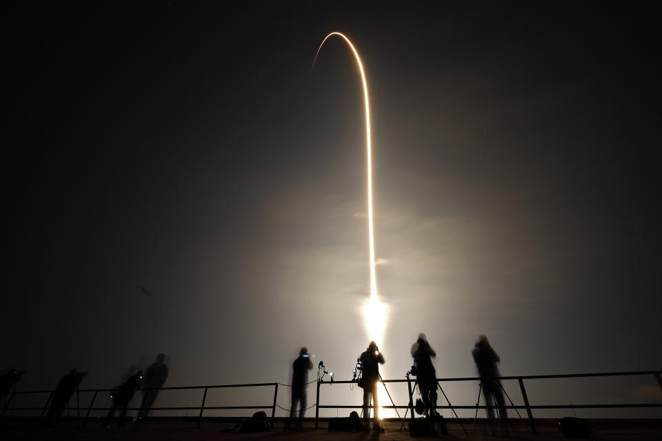 A SpaceX Falcon 9 rocket lifts off in this time exposure photograph from Launch Pad 39-A Thursday, March 2, 2023, at the Kennedy Space Center in Cape Canaveral, Fla. Four astronauts are beginning a mission to the International Space Station. (AP Photo/Chris O'Meara)