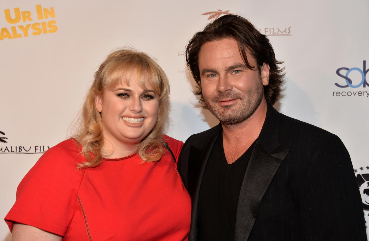 Rebel Wilson (L) and actor Mickey Gooch Jr. arrive at the Los Angeles special screening of 