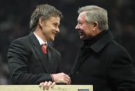 <p>Solskjaer receives an award from Sir Alex Ferguson for 14 years of service in 2010. He was, at the time, manager of Man United reserves.(Getty) </p>