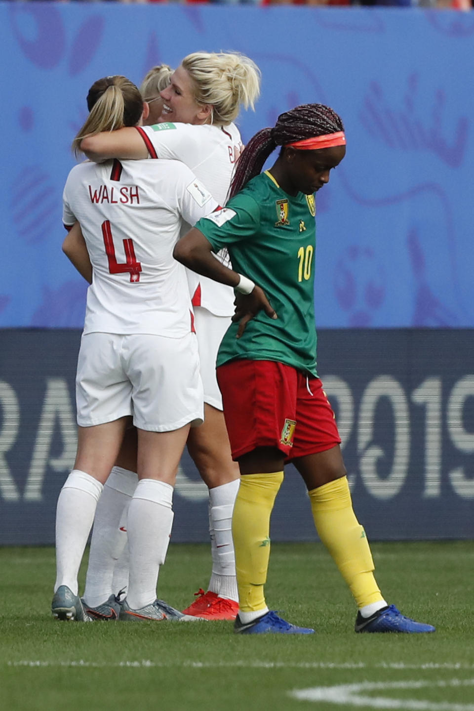 England players celebrate at the end of the Women's World Cup round of 16 soccer match between England and Cameroon at the Stade du Hainaut stadium in Valenciennes, France, Sunday, June 23, 2019. England beat Cameroon 3-0. (AP Photo/Michel Spingler)