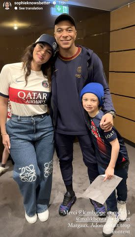 <p>Sophie Brussaux/Instagram</p> Sophie Brussaux with Kylian Mbappé and Adonis Graham