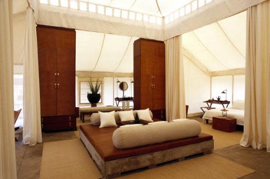  Aman-i-Khás Resort, India - There are 10 dreamy spacious canvas tents, identical in style, each set on a raised concrete plinth. The interiors boast a towering six-metre canopy in the centre of the tent, with a comfortable luxurious daybed.