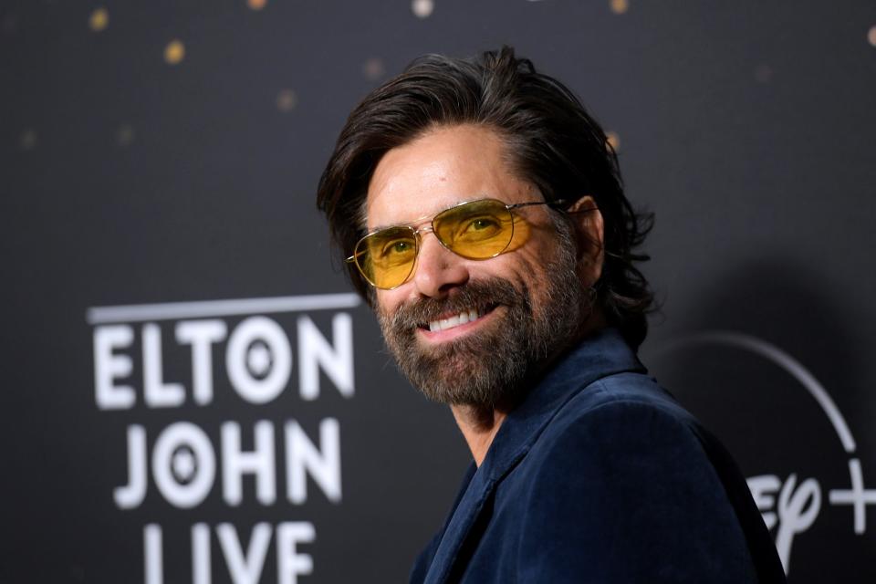 LOS ANGELES, CALIFORNIA - NOVEMBER 20: John Stamos attends the Disney+ "Elton John Live: Farewell From Dodger Stadium" Yellow Brick Road Event at Dodger Stadium on November 20, 2022 in Los Angeles, California. (Photo by Michael Tullberg/Getty Images) ORG XMIT: 775901442 ORIG FILE ID: 1443152940