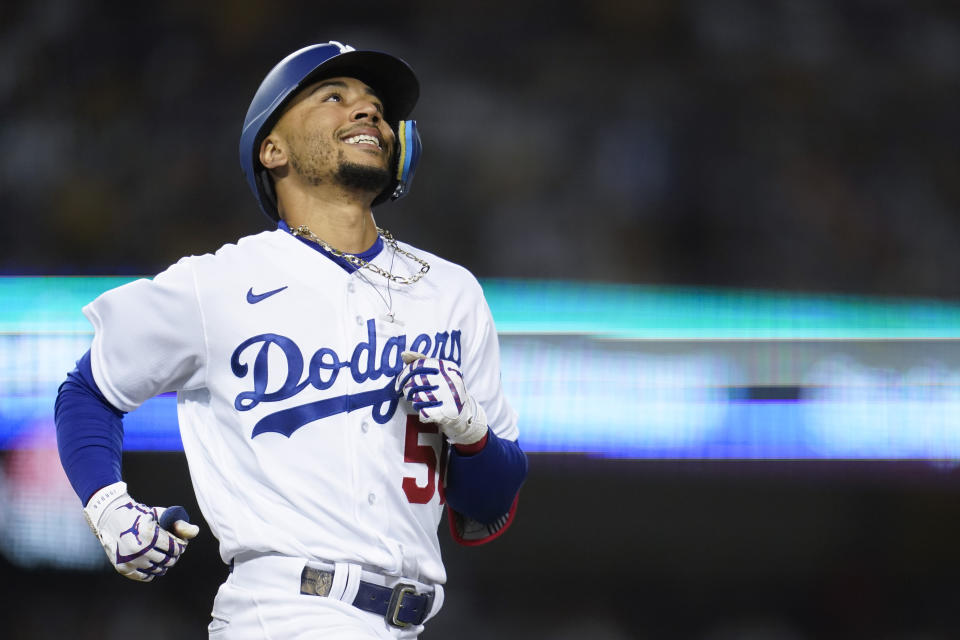 Los Angeles Dodgers' Mookie Betts (50) reacts as he grounds out to shortstop during the sixth inning of a baseball game against the Chicago Cubs in Los Angeles, Friday, July 8, 2022. (AP Photo/Ashley Landis)